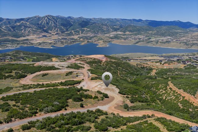 Bird's eye view of a water and mountain view | Image 4