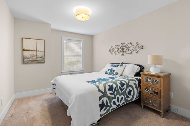 Two more comfortable bedrooms are located on the second level. | Image 17