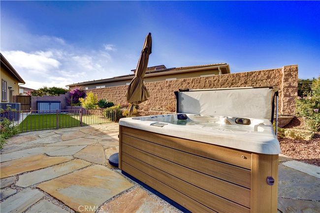 Outdoor Spa and Side Yard with Artificial Turf | Image 48
