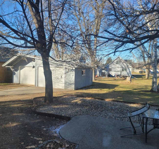 view of backyard from patio doors | Image 9