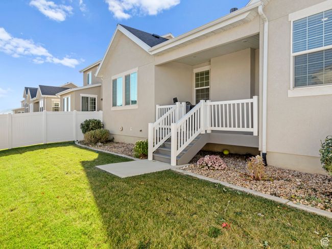 View of side of property featuring stucco siding | Image 25