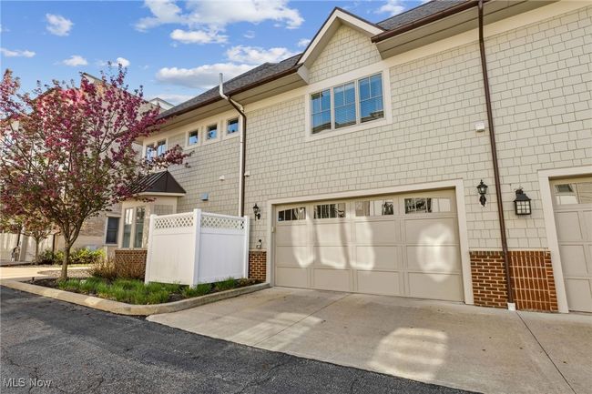View of the back and attached garage | Image 41