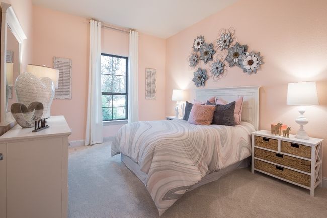 Bedroom featuring light colored carpet and baseboards | Image 5