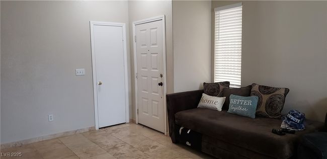 Living area with light marble finish floors | Image 21