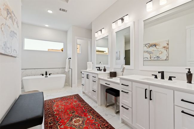 Full bathroom with visible vents, a freestanding bath, recessed lighting, marble finish floor, and vanity | Image 21