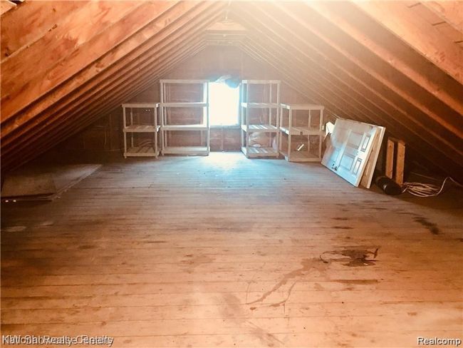 Loft above garage for storage | Image 35