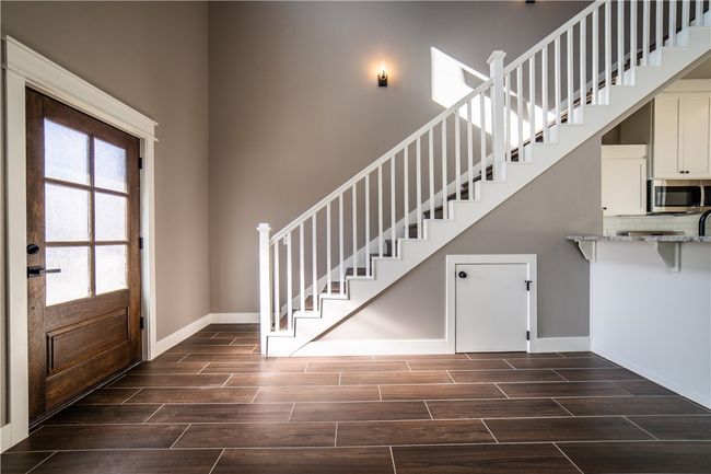 Front door and stairs to 2nd level | Image 6