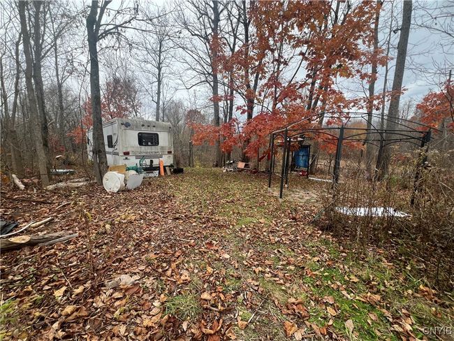 Campsite area next to garage | Image 6