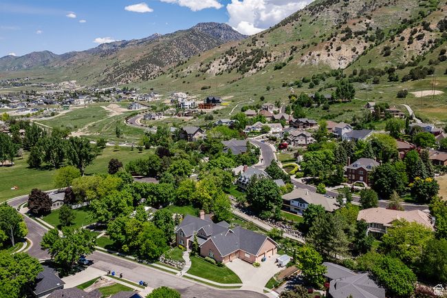 Aerial view of property's location with nearby suburban area and mountains | Image 109