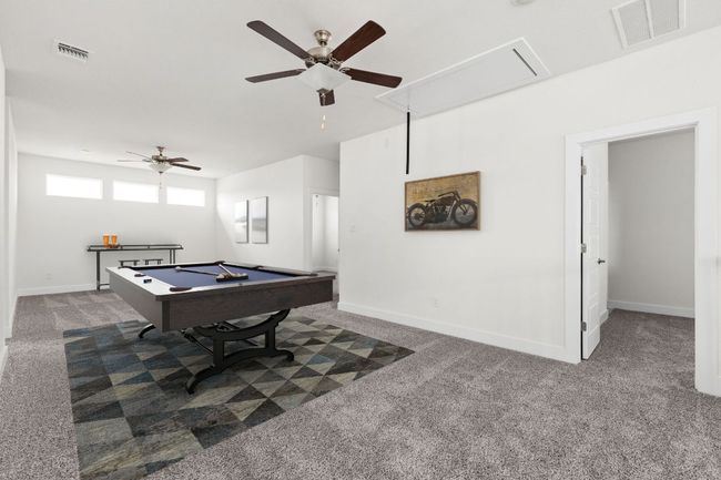 Game room featuring attic access, carpet flooring, ceiling fan, and billiards | Image 4