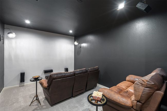 Carpeted home theater room featuring baseboards and recessed lighting | Image 27