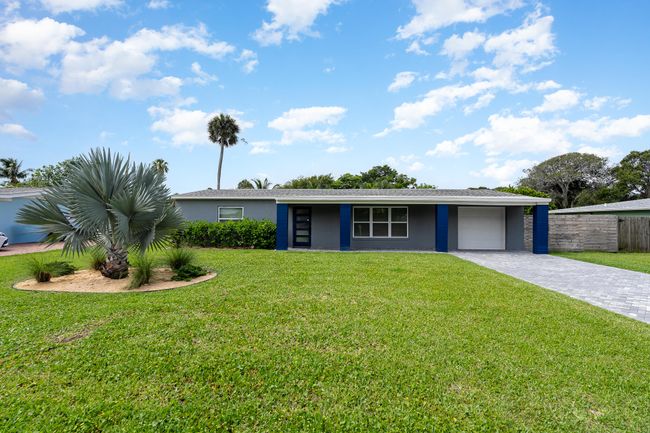 The beautiful paver driveway offers plenty of parking. | Image 8