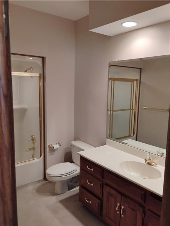 Upstairs Full bathroom with shower / bathing tub combination, vanity, recessed lighting, and toilet | Image 70