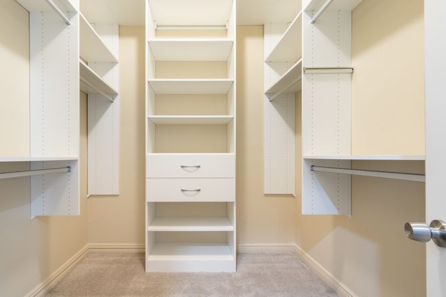 Spacious closet with carpet | Image 20