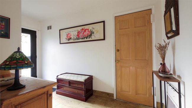 Foyer entrance with light wood-style flooring and ornamental molding | Image 19