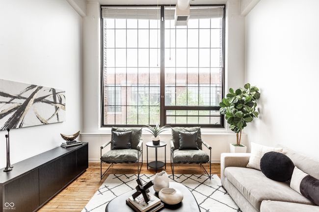 sitting room featuring wood finished floors | Image 8
