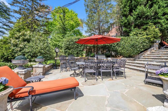 View of patio / terrace featuring outdoor dining space and stairs | Image 26