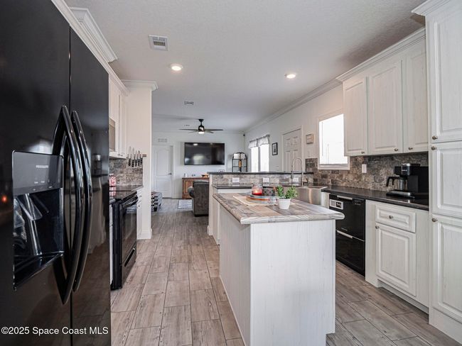 623 Hyacinth Cir, House other with 3 bedrooms, 2 bathrooms and null parking in Barefoot Bay FL | Image 21