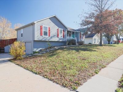 View of front of home featuring a garage and a front lawn | Image 2