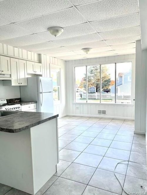 1603 Union Blvd, Bay Shore, NY, 11706-7327 | Card Image