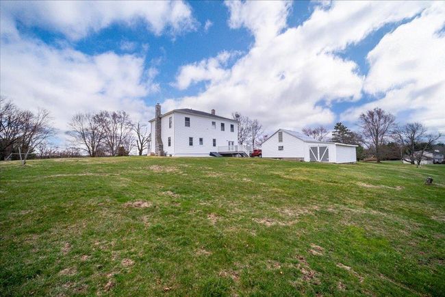 View of yard featuring an outdoor structure | Image 22