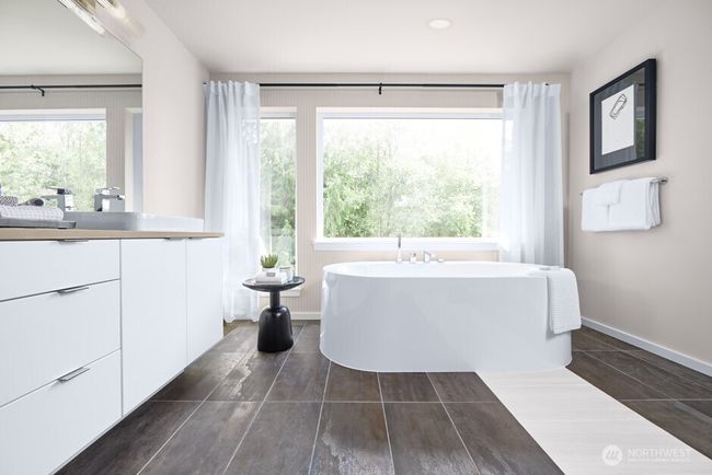 Luxurious Master Bath with free-standing tub, vessel style sinks and designer lighting. Facade, Ext Colors, Interior Photos & Floor Plans for illustrative purposes only. Actual Facade, Ext Colors, Interiors & Floor Plans may differ. | Image 10