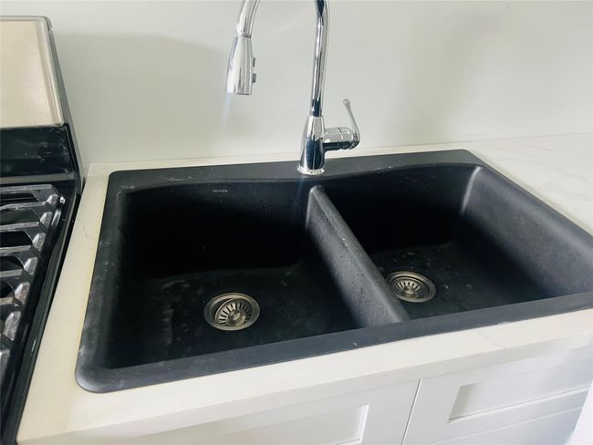 Kitchen has brand new double sink and a new dishwasher | Image 4