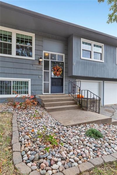 Entrance to property with a garage | Image 3