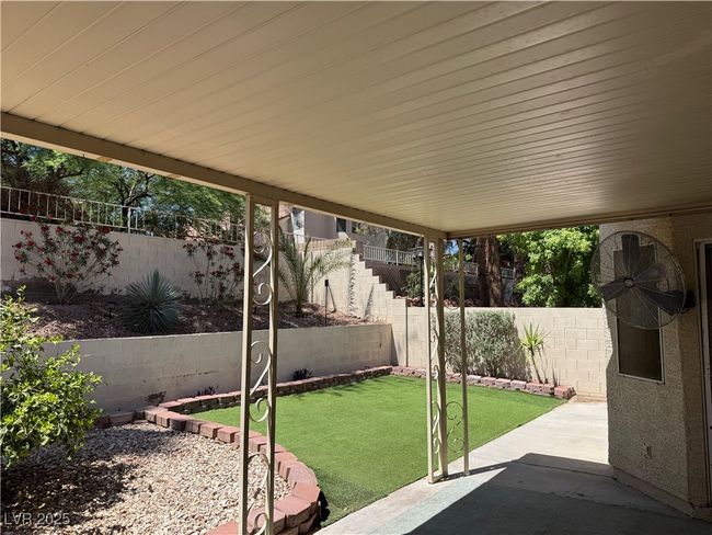 Fenced backyard featuring a patio area | Image 13