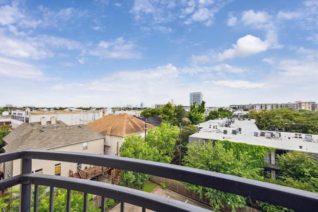 A breathtaking view from the balcony captures the stunning Houston skyline. | Image 20