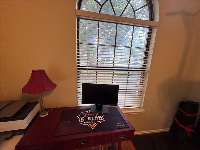 Office area featuring plenty of natural light | Image 19