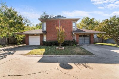 View of front property featuring a garage | Image 1