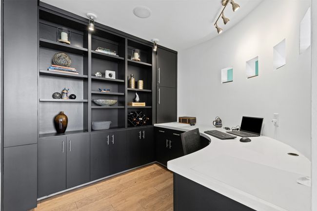 Home office featuring light wood-style floors | Image 12