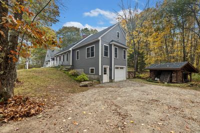 This side of the home (3 levels) was added in 2018. There is a separate driveway for this garage bay. | Image 3