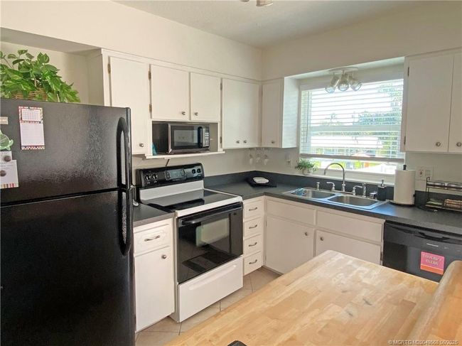 1606 Egret Way, House other with 4 bedrooms, 2 bathrooms and 2 parking in Palm City FL | Image 6