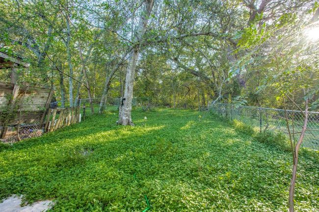 View of yard featuring fence | Image 24