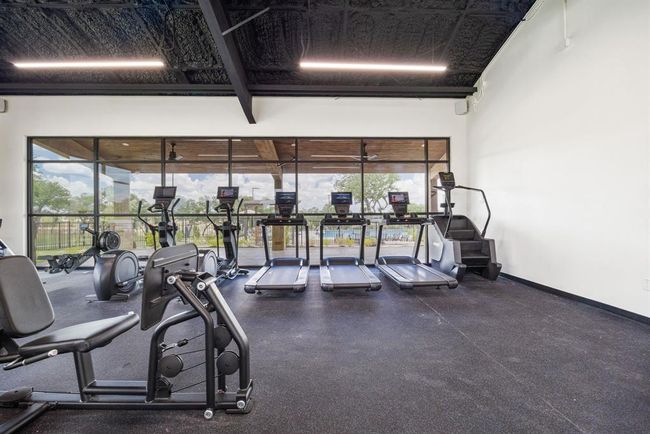 Exercise room with baseboards | Image 33