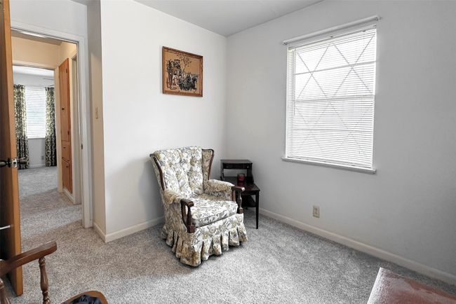 Spacious bedroom has two windows | Image 24