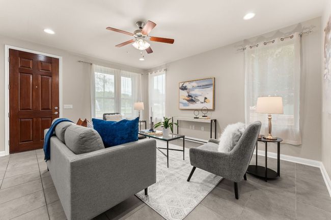 Living room with ceiling fan and recessed lighting | Image 4