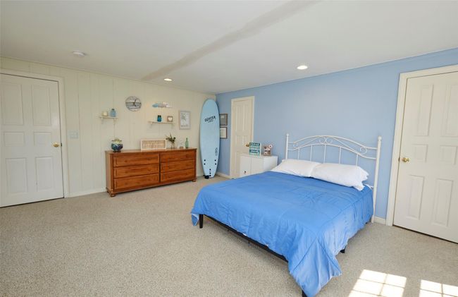 Bedroom featuring carpet flooring, baseboards, and recessed lighting | Image 18
