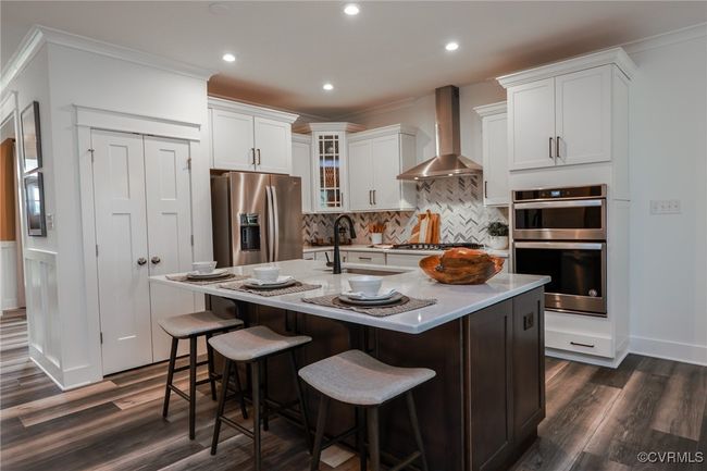 VIRTUAL STAGING. Photo represents the plan with virtual staging. Kitchen with island and pantry. | Image 7