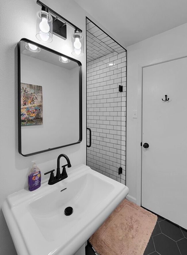 Full bath featuring a shower stall and tile patterned flooring | Image 23