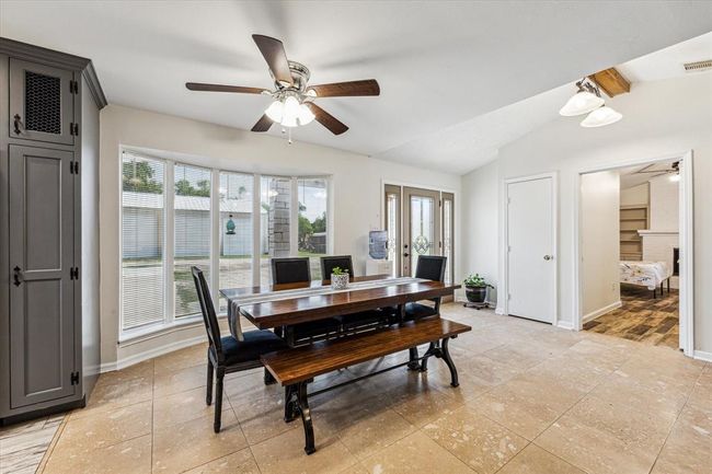 The dining area just off the entry creates a seamless transition from the entrance to the heart of the home, where people naturally gather to share meals and conversation, with enough space to accommodate a 6-8 top table | Image 15