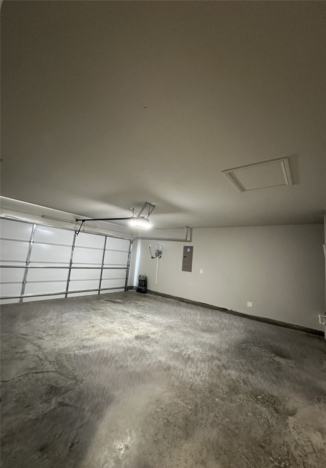 Garage featuring electric panel | Image 22