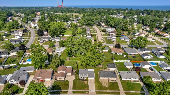 Aerial view of property's location with nearby suburban area | Image 46