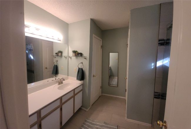 New ceramic tile flooring and a walk-in shower were added to the main bathroom in 2019 | Image 20