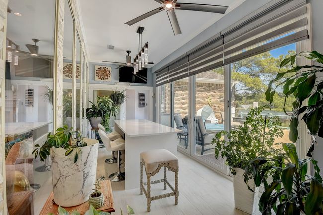 Let the light shine in with multi slide stores and custom motorized shades | Image 11