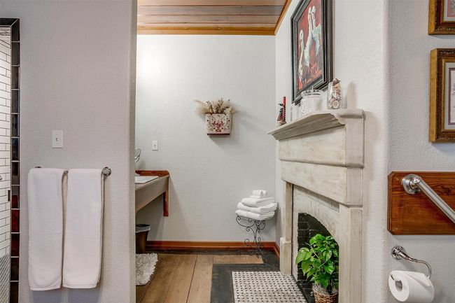 Keller's Studio vanity area and fireplace | Image 20