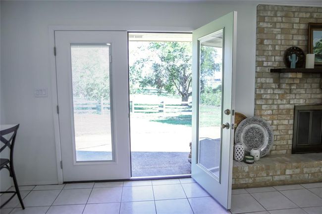 View toward the back through the new French doors with internal blinds | Image 23