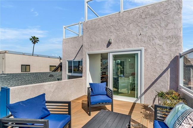 Comfortable and inviting deck off the kitchen | Image 14